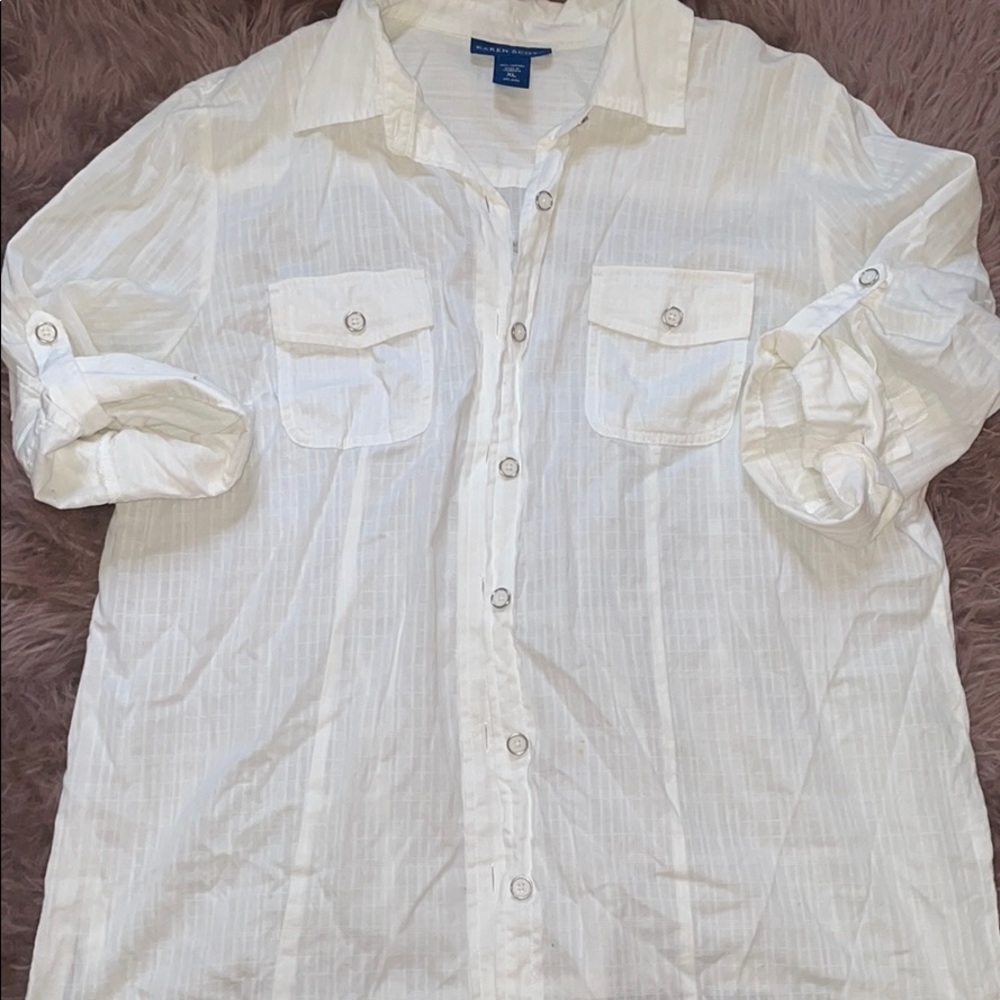 Lightweight white button-up. 3/4 length sleeves.